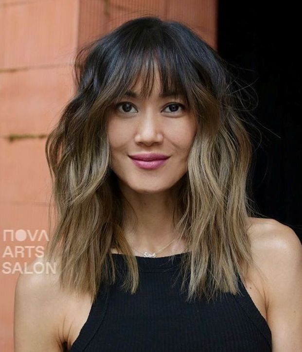 Textured Medium Hairstyle for a Round Face