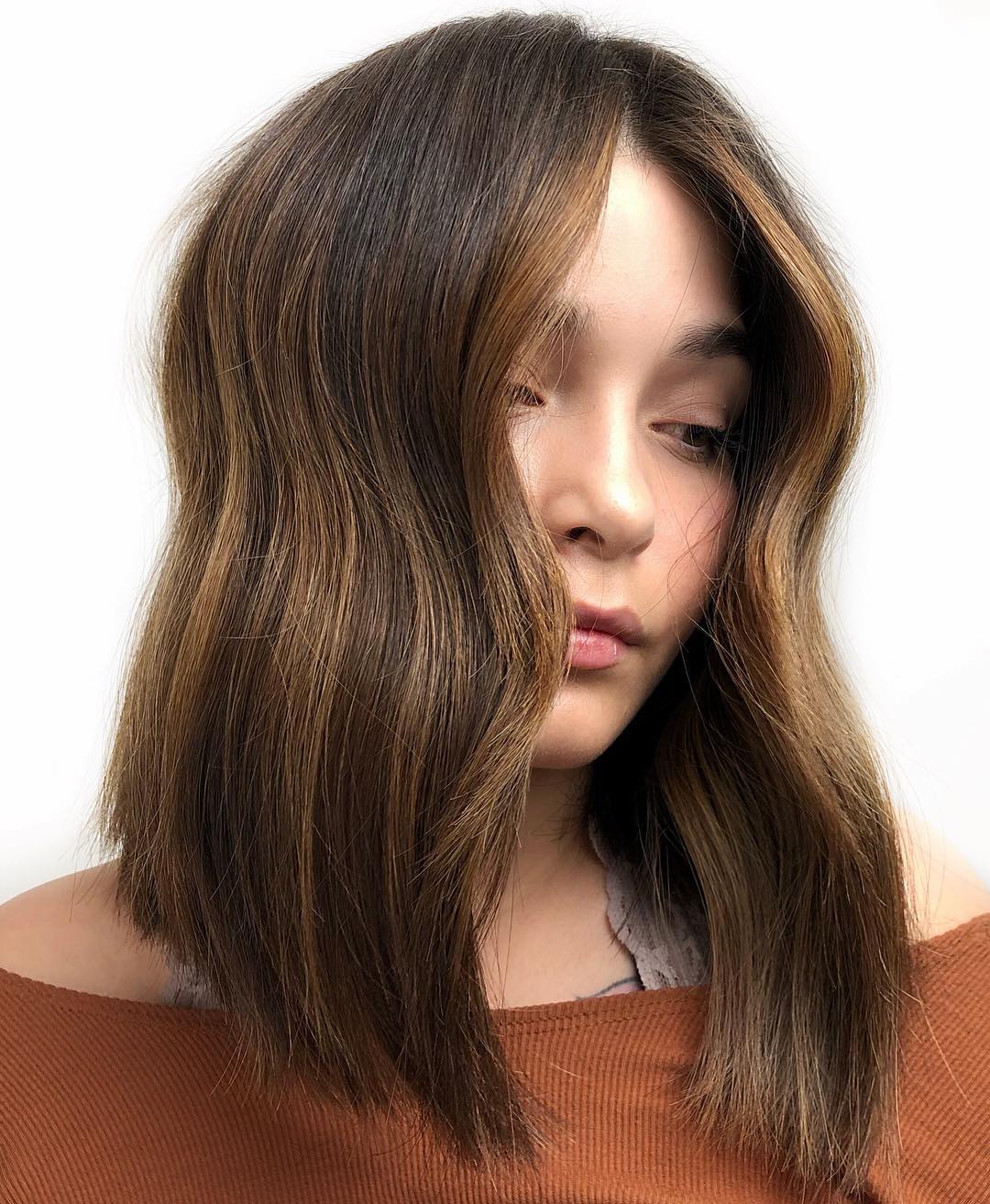 Medium Length Thick Wavy Hairstyle